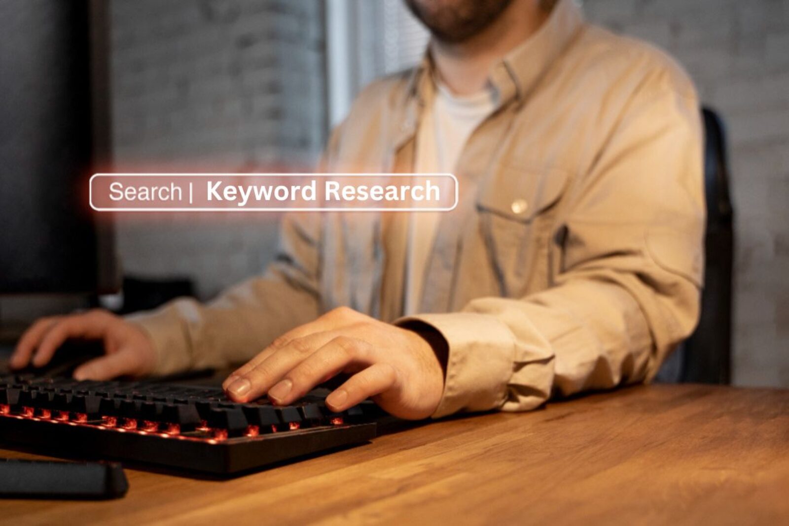 person conducting keyword research on laptop